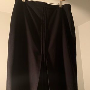 Black pencil skirt w/ kick pleat in front and back